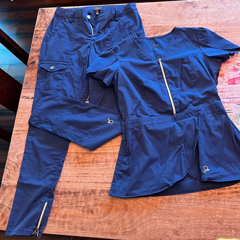 Women’s Jaanuu Rose Zip Scrub Top with matching Shanti Cargo Scrub Pants.